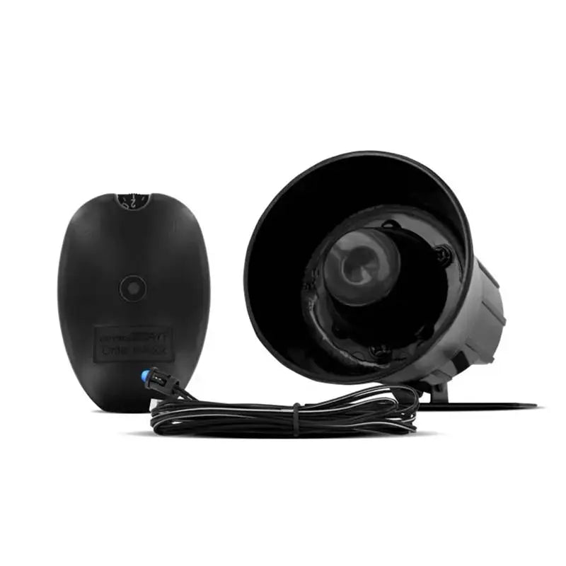 Two black motorcycle speakers with a cable on a white background