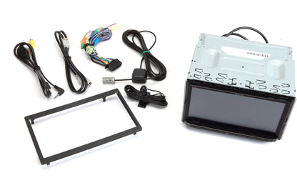 Car stereo installation kit with components on a white background