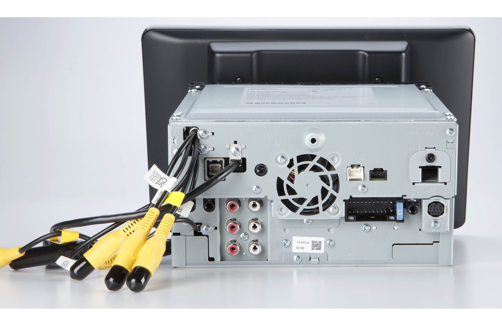 Back view of a car stereo system with cables