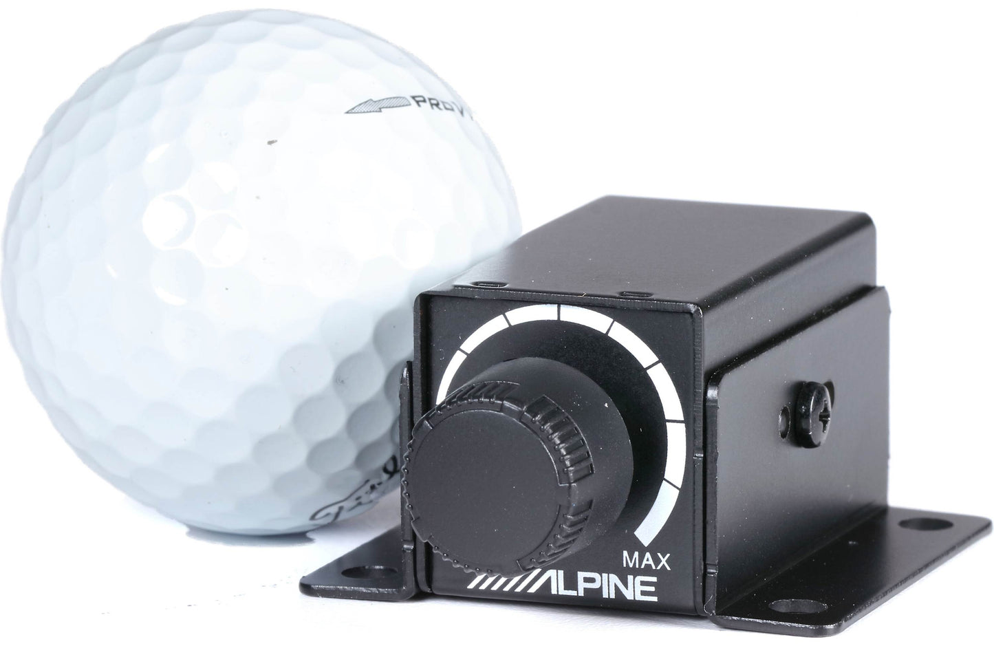 Golf ball next to a black Alpine device