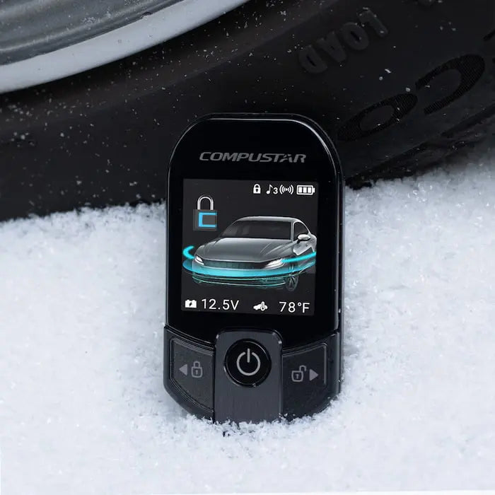 Compustar device on a car tire in the snow